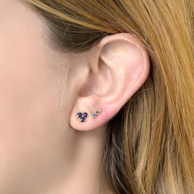 Anne Sportun 18k yellow gold ear climber stud earrings with 3 blue cut sapphires of varying sizes