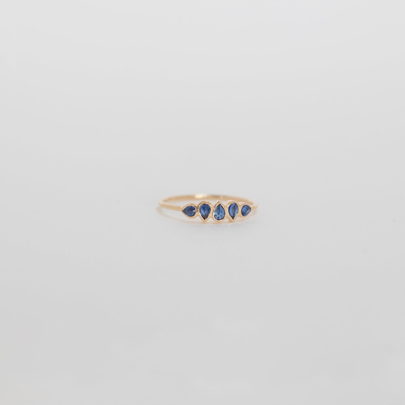 Celine Daoust 14k yellow gold rose cut stackable band ring with blue sapphires 