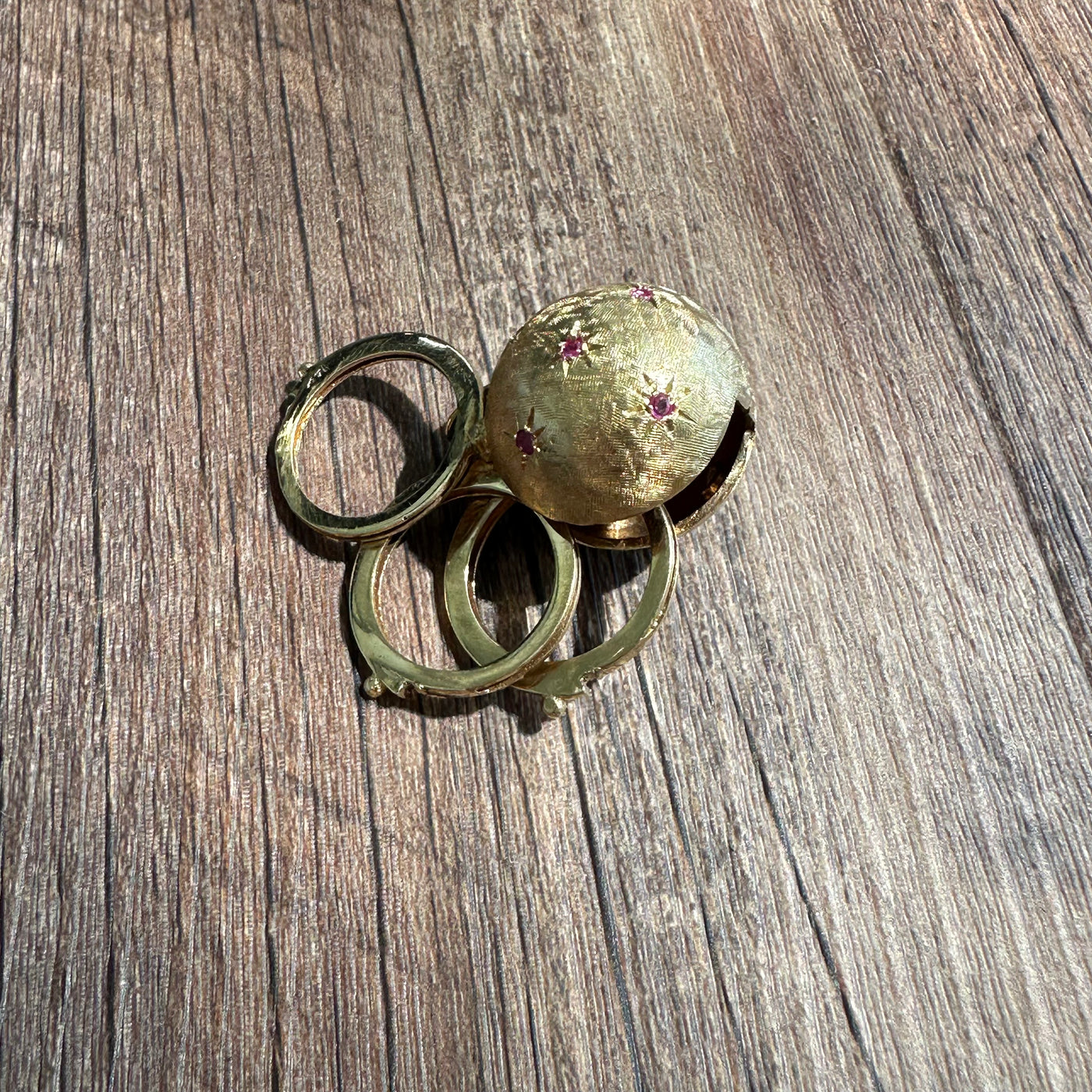 Estate & Vintage 14k yellow gold hollow gemstone orb locket with sapphire rubies 1950s unique keepsake. Can hold 3-6 photos (double-sided).