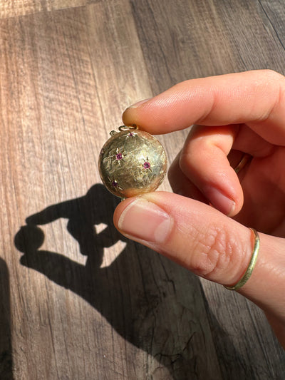 Estate & Vintage 14k yellow gold hollow gemstone orb locket with sapphire rubies 1950s unique keepsake. Can hold 3-6 photos (double-sided).