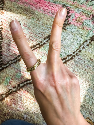 Kate Collins 14k yellow gold rolling ring six gold bands interweaved/connected fidget ring