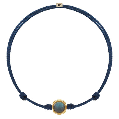 Luis Morais 14k Yellow gold rotary bead with a cabochon labradorite collar on an adjustable navy blue silk cord bracelet