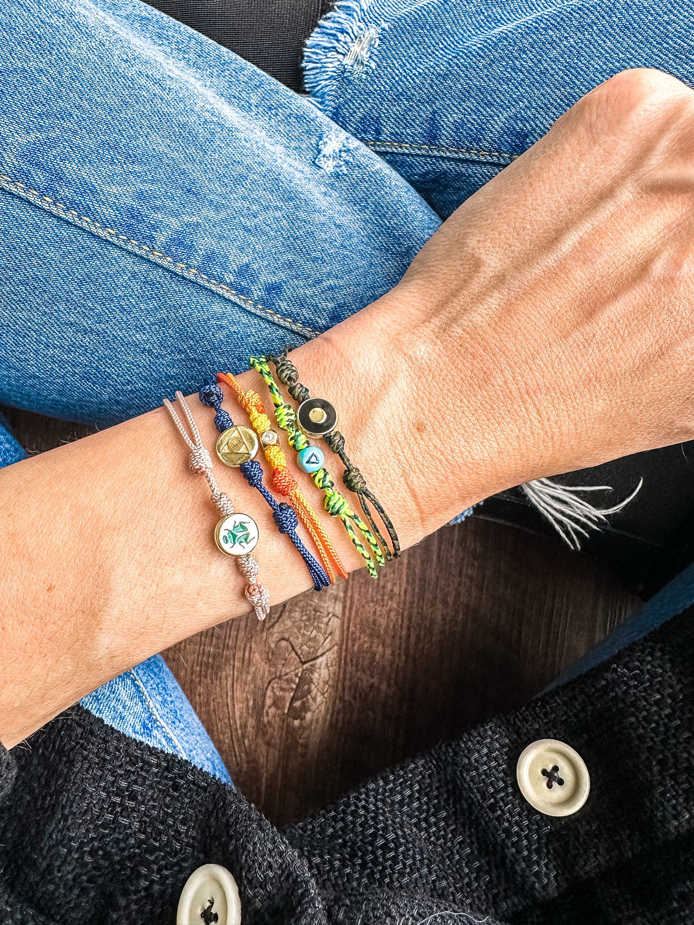 Luis Morais enamel evil eye 14k gold disk on a silk cord bracelet