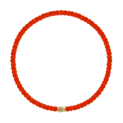 Luis Morais 14 yellow gold tiny horseshoe symbol spacer bead on a red glass beaded bracelet
