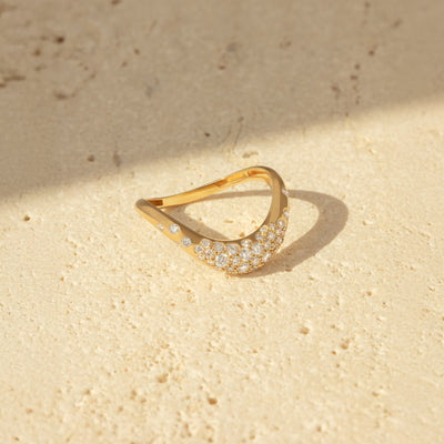 L'Atelier Nawbar 18k yellow gold curved ring with a scattering of white diamonds, stackable