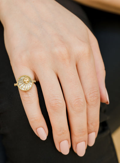 L'Atelier Nawbar 18k yellow gold 3-in-1 Day and Night ring with black onyx, mother of pearl, and white diamonds. Can also be a pendant