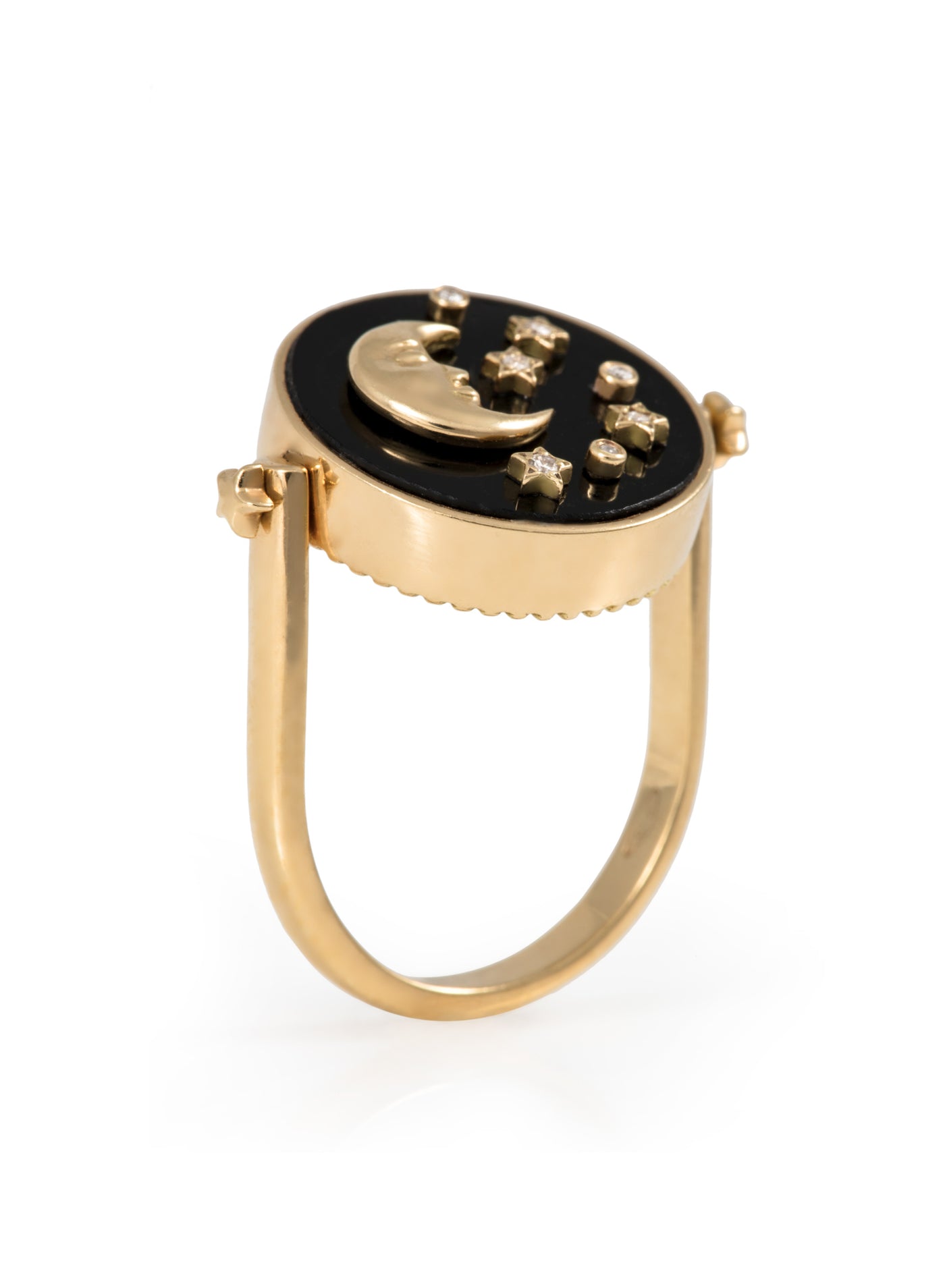 L'Atelier Nawbar 18k yellow gold 3-in-1 Day and Night ring with black onyx, mother of pearl, and white diamonds. Can also be a pendant