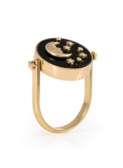L'Atelier Nawbar 18k yellow gold 3-in-1 Day and Night ring with black onyx, mother of pearl, and white diamonds. Can also be a pendant