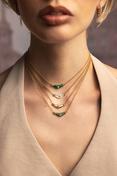 L'Atelier Nawbar 18k yellow gold necklace with carved malachite and a pear shaped white diamond
