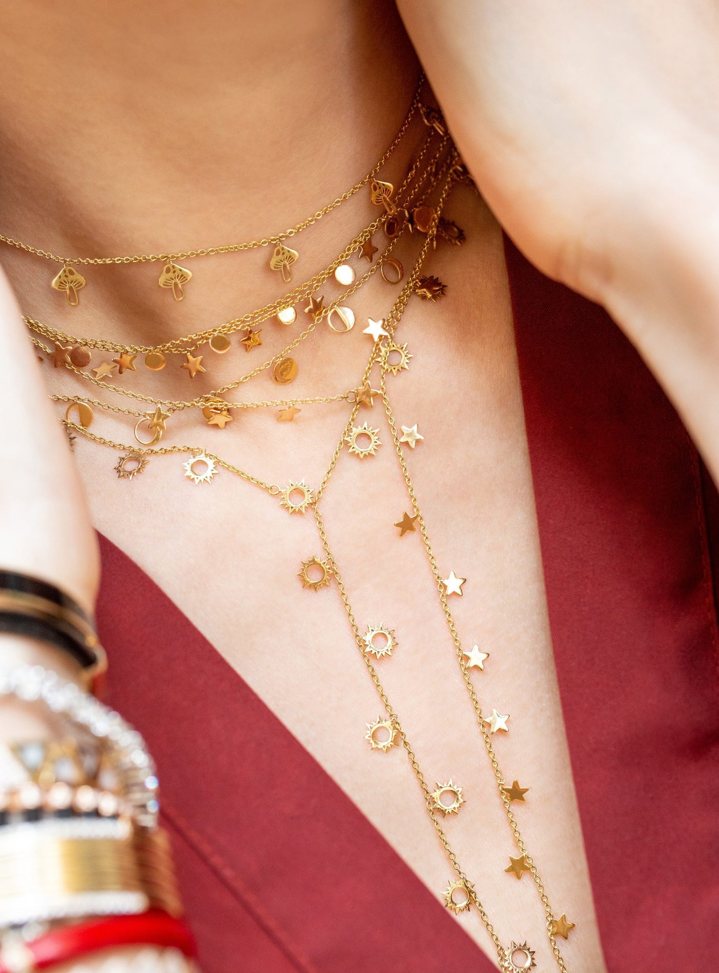 L'Atelier Nawbar 18k yellow gold moon circulation choker with different phases of the moon.