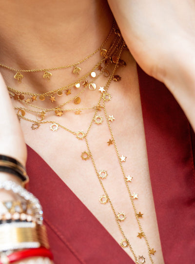 L'Atelier Nawbar 18k yellow gold moon circulation choker with different phases of the moon.