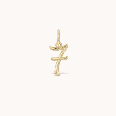 Marlo Laz 14k yellow gold charm featuring raised gold details numerology lucky number 7