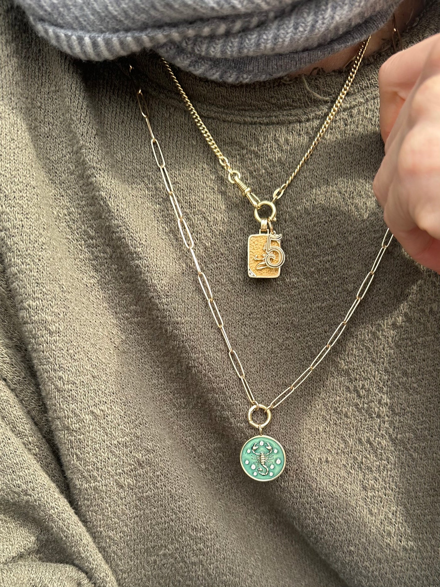 3.8mm elongated link 14k yellow gold paperclip chain with a round hinged clasp for charms, with Kate Collins scorpion charm and Marlo Laz number charm