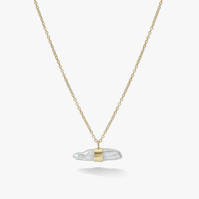 White Space jewelry 14k yellow gold necklace with oblong Aalto lagniappe pearl