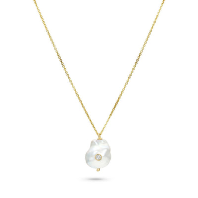 White Space 14k yellow gold necklace with a baroque pearl pendant with a white diamond