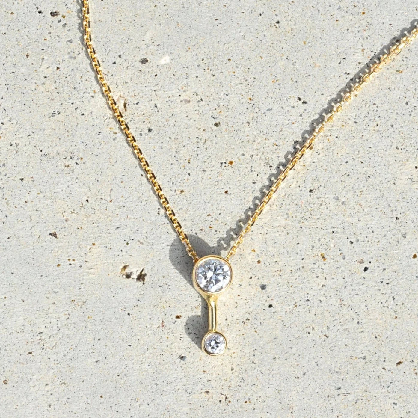 White Space Jewelry 14k yellow gold white double diamond bezel set necklace