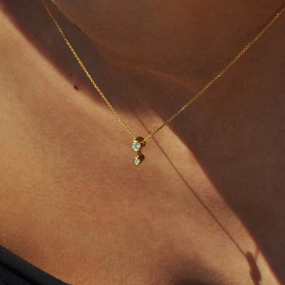 White Space Jewelry 14k yellow gold white double diamond bezel set necklace