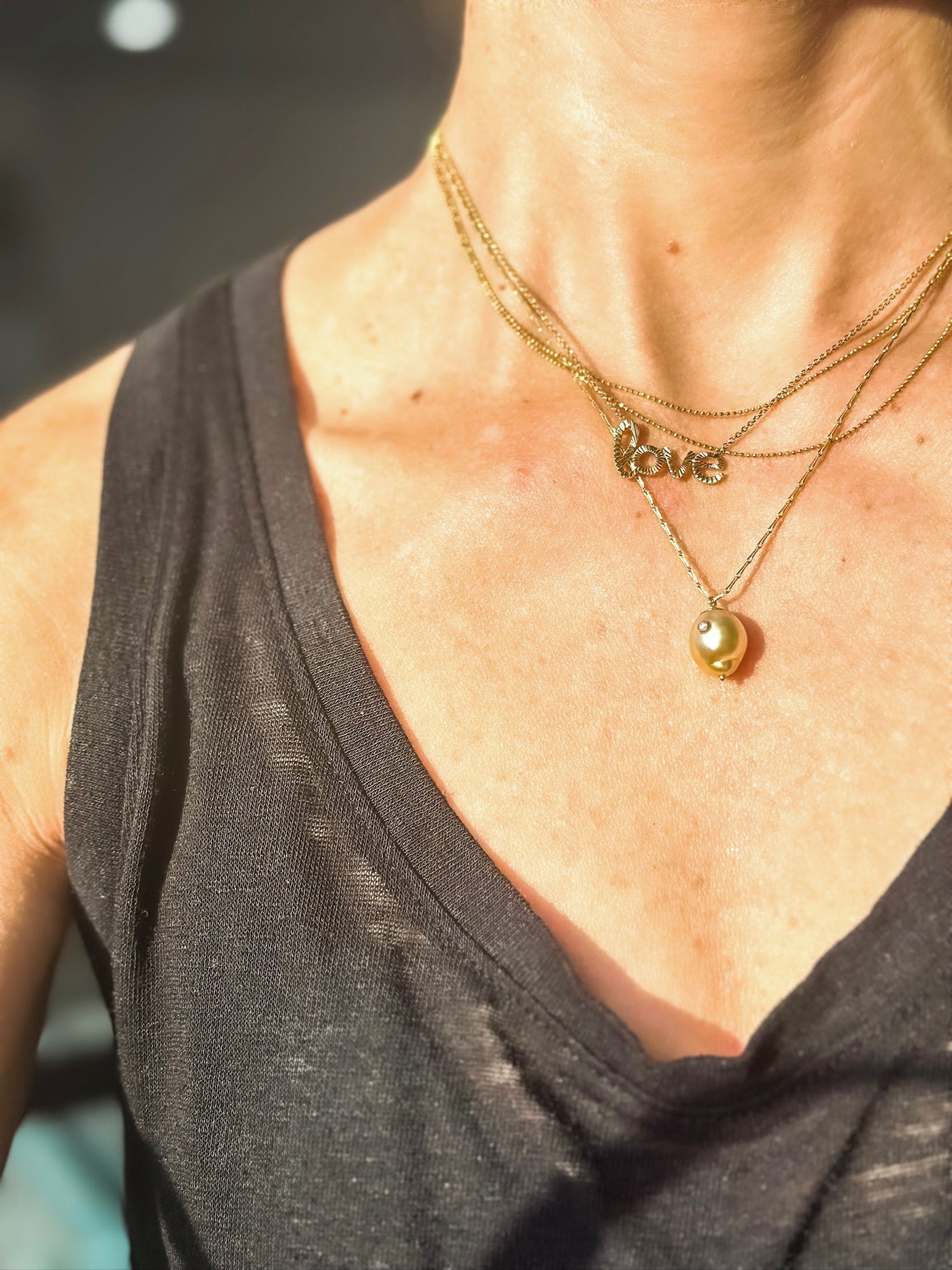 White Space 14k yellow gold Kenna golden South Sea Baroque Pearl pendant necklace with white diamond. 