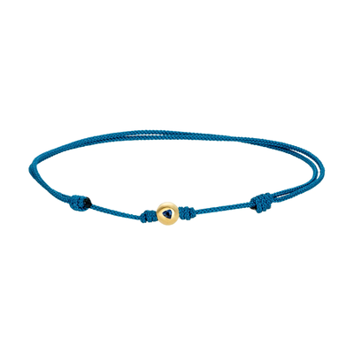Gold Ball with Sapphire Trillion on Cord Bracelet