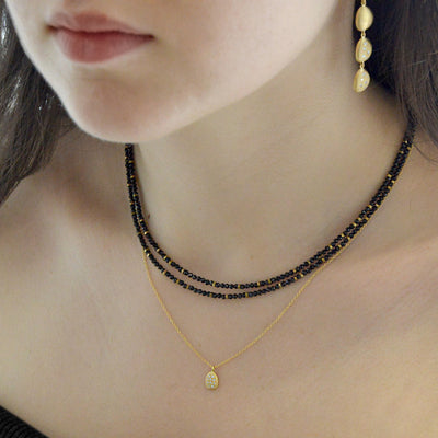 Anne Sportun black spinel 14k yellow gold wrap bracelet or necklace with stone beads. 