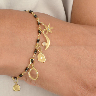 Anne Sportun 18k yellow gold charm with diamond center