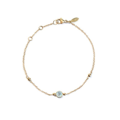 Anzie round October opal gemstone is bezel set in 14k gold and linked together with a cable chain.