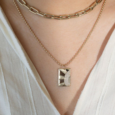 Julez Bryant 14k gold CALS rectangular pendant with full cut round green diamonds and blue sapphires. 